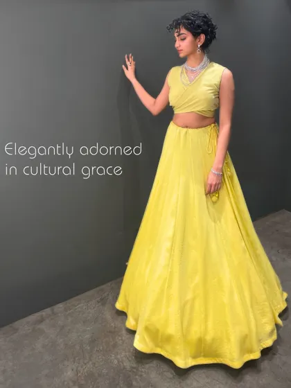 Elegantly adorned in cultural grace, this vibrant yellow lehenga is perfect for a Haldi ceremony or a festive day event, ensuring you own the occasion.