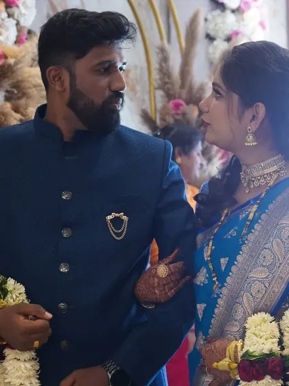An intimate look shared between the bride and groom. Her makeup is elegant and timeless, ensuring these photos will be cherished for years.