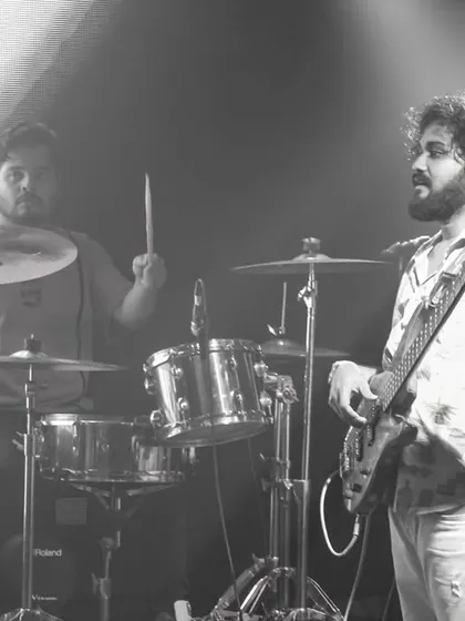 The rhythm section, our drummer and bassist, holding down the groove. A solid foundation is key to our tight, powerful sound, perfect for getting people to dance.
