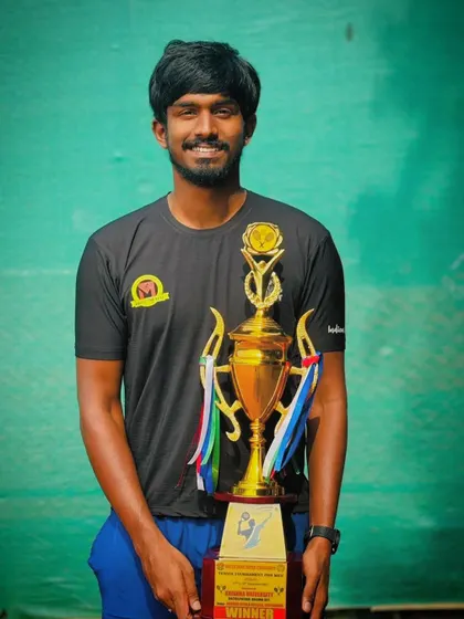 Oges with the impressive gold medal trophy from the South Zone Inter-University tournament, where he was a key player.