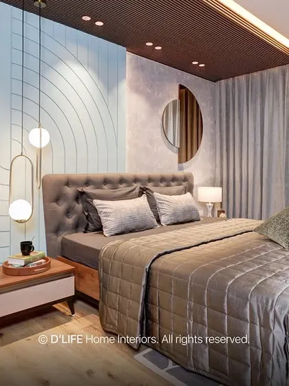 This bedroom in Madurai showcases artistic brilliance with its unique wall design, combining textures and patterns. The space is both vibrant and cozy, a perfect example of contemporary design.