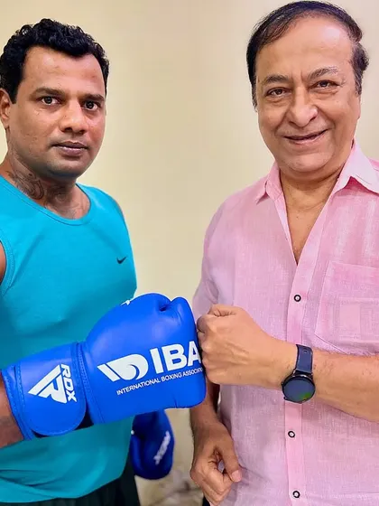 Another picture with Capt. Das, a fatherly figure in my life. The relationships and support system behind a boxer are just as important as the training itself. I am always thankful for his guidance.