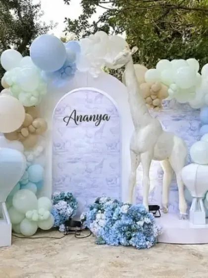 A duplicate image showing the beautiful pastel setup, highlighting the organic balloon arch and custom name backdrop.