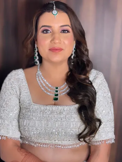 Annie's wedding day glam. The look is polished, radiant, and absolutely timeless.