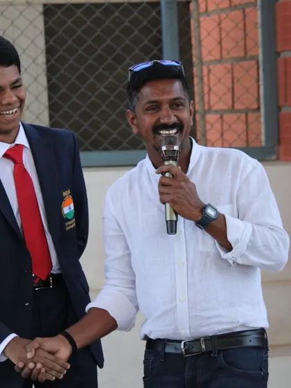 A moment of shared joy and appreciation with our guest of honor during the awards ceremony.
