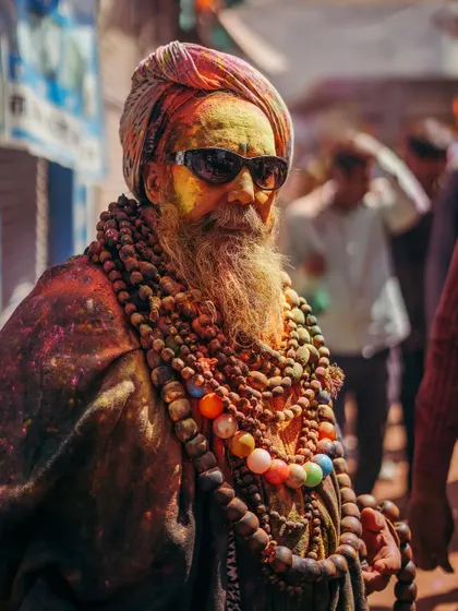 A comprehensive photo series from Lathmaar Holi in Barsana. These images document the unique tradition where women playfully hit men with sticks, recreating a legend of Lord Krishna and Radha. The photos are filled with motion, color, and raw emotion.