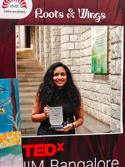 Posing with my award at the TEDx IIM Bangalore event. Being part of this platform was a delightful experience and a wonderful opportunity to merge art with impactful conversations.