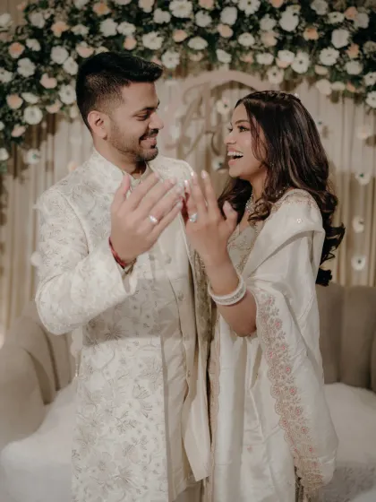The pure, unscripted joy right after the rings are exchanged. This candid shot captures the couple's excitement and happiness in its most authentic form.