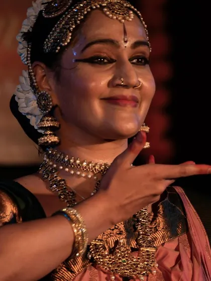 A close up capturing the subtle nuances of the dancer's expression.