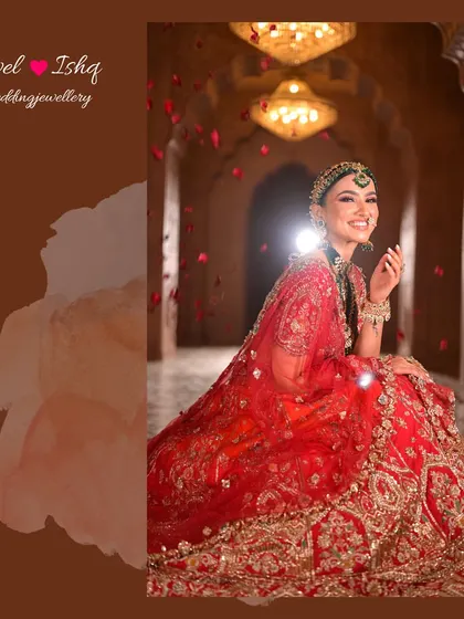 The bride seated in a grand corridor, her red lehenga spread out around her. The jewellery sparkles, adding to the opulence of the scene.