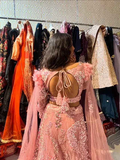 The back of this pink lehenga is just as stunning, with a stylish tie-up detail. It’s a modern design for the fashion-forward girl.