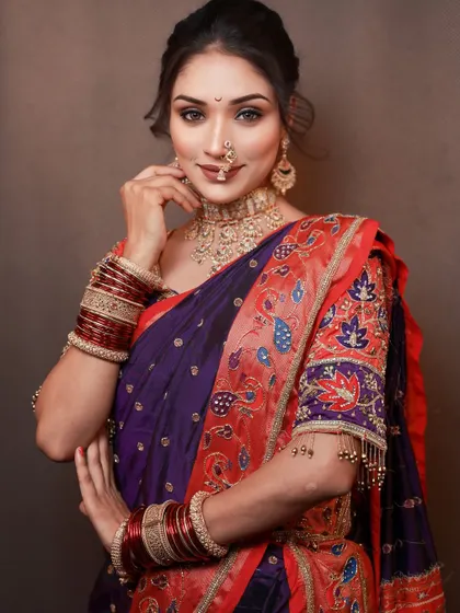 Another angle of this beautiful traditional look. The makeup enhances the model's features while staying true to the classic Marathi style.