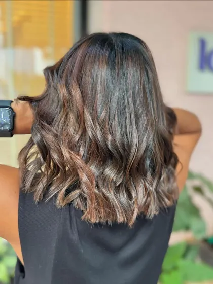 The shine on this espresso-toned hair is everything. A great example of a healthy, glossy, non-bleach color. (No filter)
