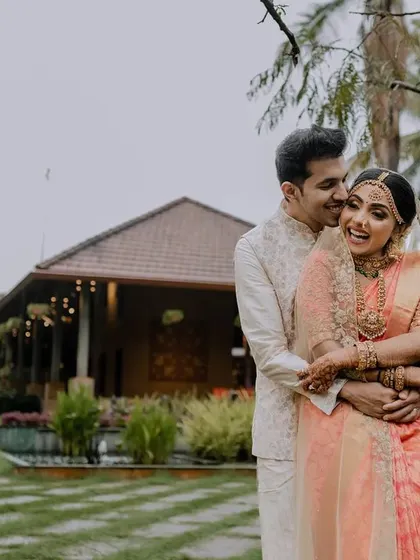 A beautiful, candid moment between the bride and groom. We use natural surroundings and soft light to create portraits that feel both intimate and timeless.
