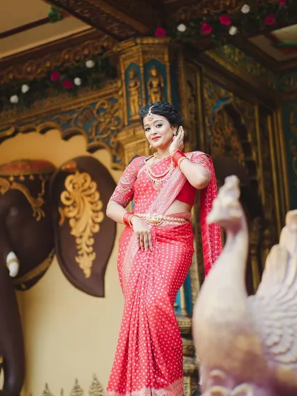 Another beautiful angle of our red Banarasi silk saree, a perfect choice for any bride.