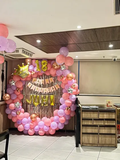 The 18th birthday ring setup shown within the context of the restaurant space.