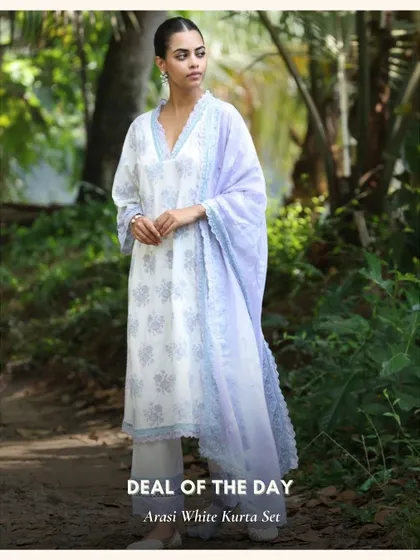 The Arasi White Kurta Set, a beautiful and serene piece featured as a deal of the day. The lavender dupatta adds a soft touch of color.