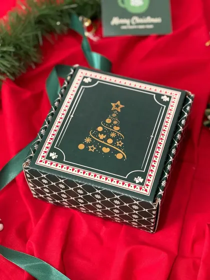 An elegant green and white patterned Christmas gift box. The sophisticated design is perfect for premium corporate gifts or for that special someone.