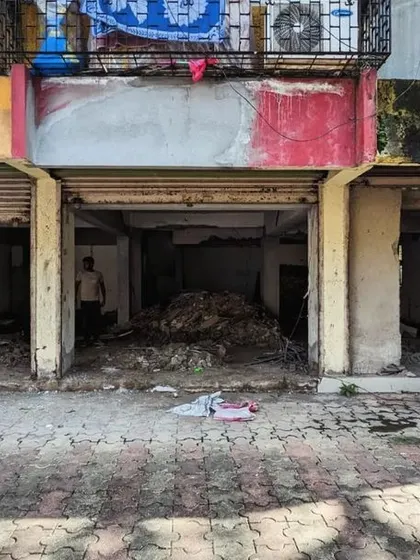 The Capsul streetwear store in Bandra was a former bank. This 'before' shot shows the raw space we started with. Our vision was to create a flexible venue that could switch from a retail store to a community gathering spot, echoing the vibrant urban energy of the neighborhood.