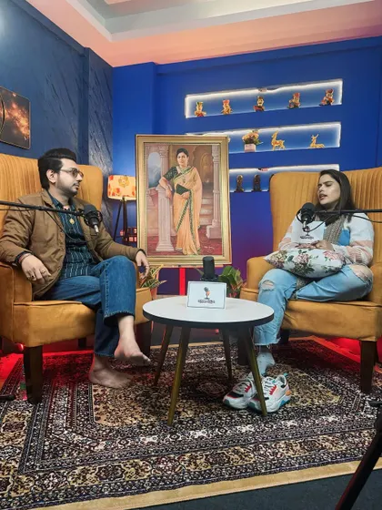 A photo taken during a podcast shoot. The conversation flowed from art to spirituality, with one of my mother's portraits watching over us.