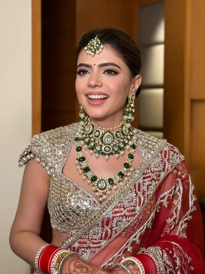 The joy of a bride on her wedding day. Her smile says it all, and the makeup is there to make sure she feels as beautiful as she looks.