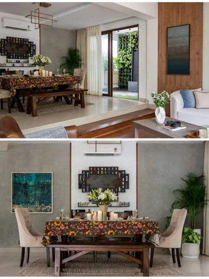 The dining and living areas of "Villa Tranquility" are designed with a split-level layout, creating distinct zones while maintaining an open feel. A door leads to a vertical garden, further blurring the line between indoors and out.