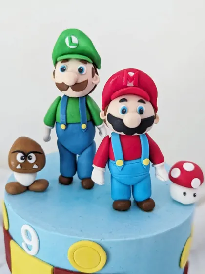 A close-up of the handcrafted Mario and Luigi figurines, ready for an adventure.