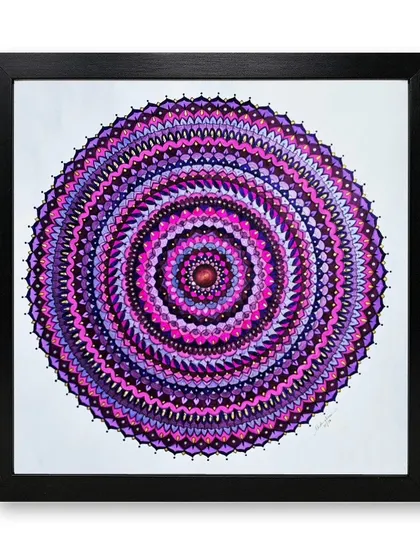 The magenta mandala in a black frame, offering a different look. The black frame makes the bright magenta and purple colors appear even more vibrant.