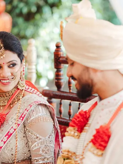 A beautiful, candid glance shared between the bride and groom during their ceremony.