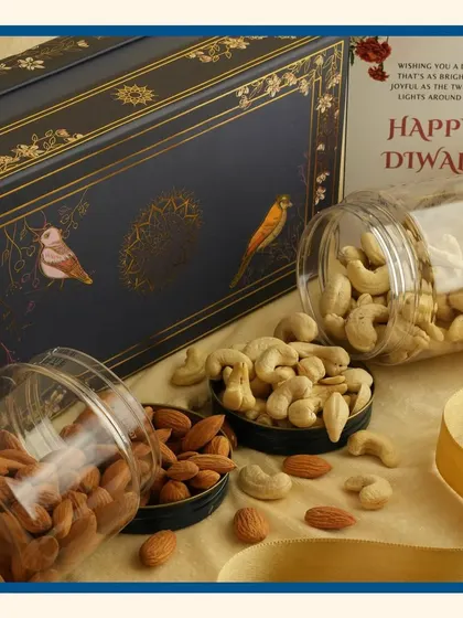 This shot shows the "Royal Blue" box with jars of almonds and cashews, a classic and healthy choice for Diwali gifting.