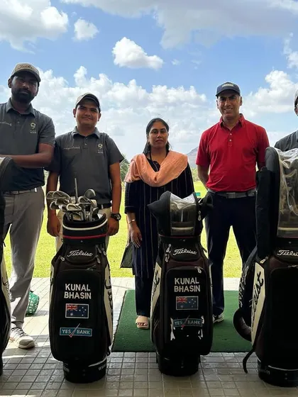 The full 9 Aces team, ready to welcome you to the academy. Swing by to meet us and start your journey in golf.