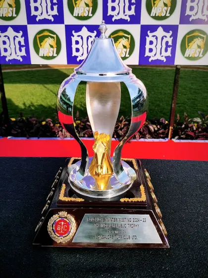 The Indian Republic Cup, a grand silver trophy with a golden horse head inside.