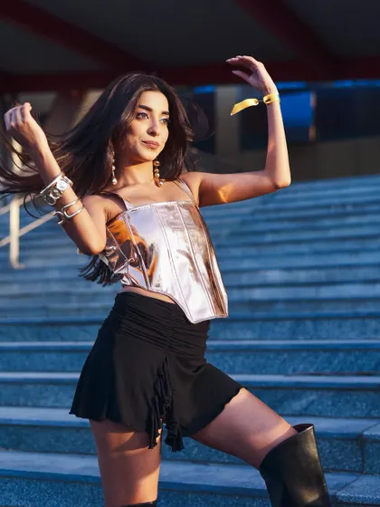 This image captures the model in a candid, expressive pose, showcasing her personality for her acting portfolio.