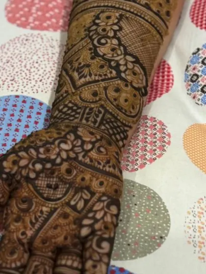 This is a detailed view of my intricate bridal henna work. Each design is unique, combining traditional patterns like paisleys and mandalas with fine-line fillers to create a stunning, full-coverage look for your special day.