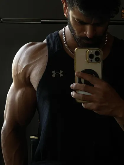 The result of a serious shoulder pump. We focus on hitting all three heads of the deltoid to build round, full, and vascular shoulders.