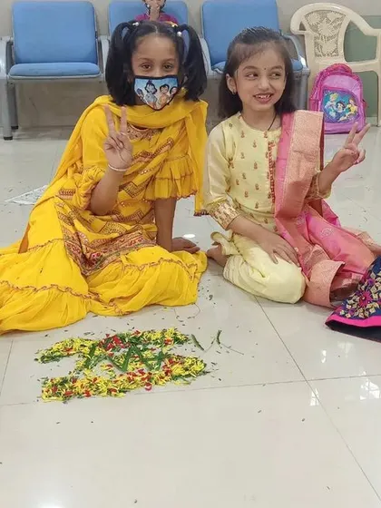 Peace, smiles, and a finished Pookalam. This is what our summer camp is all about: creating beautiful things and even more beautiful memories.