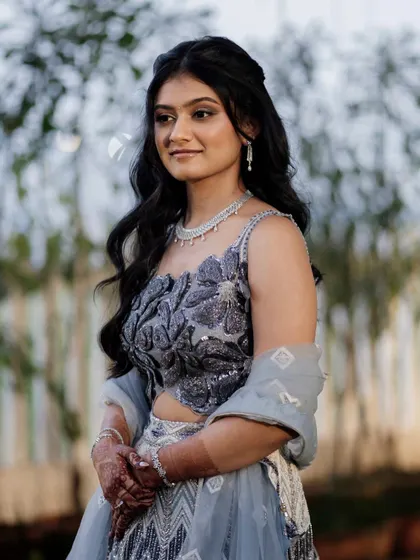 A portrait of the bride at her outdoor engagement. The soft, diffused lighting is perfect for showing off her dewy skin.