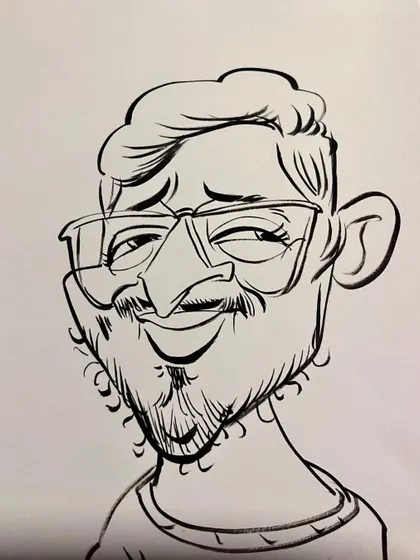 A close-up of a black and white ink sketch. I focus on the eyes and smile to bring out the personality of the person I am drawing.