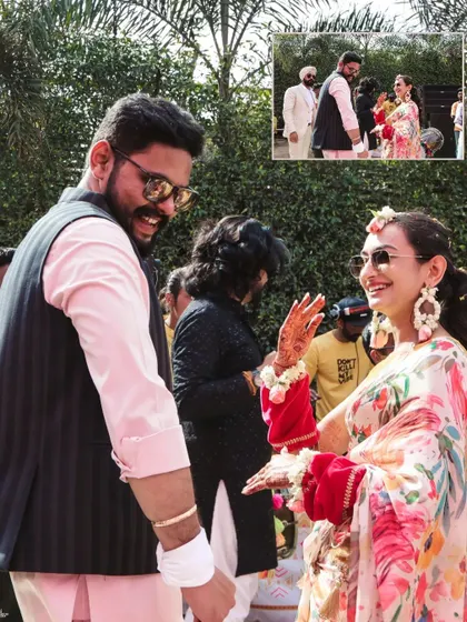A candid shot of the couple sharing a laugh during their Haldi. These genuine interactions are what make a wedding album special.