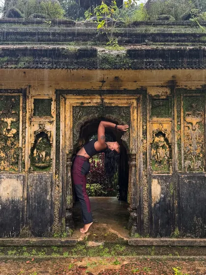 Finding moments of stillness and awareness in beautiful places. This is a deep backbend in a historic, moss-covered temple in Coorg during the monsoon. It’s a reminder to be fully present and appreciate the beauty that surrounds us.