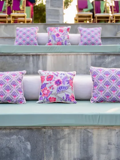 The tiered seating is made comfortable with custom mattresses and colorful cushions.