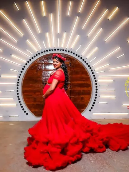 This modern, artistic backdrop provides a stunning contrast to the vibrant red maternity gown. I love finding the perfect combination of outfit, makeup, and location for my clients.