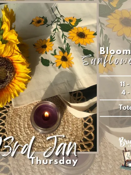 A hand-painted tote bag featuring blooming sunflowers. In our workshops, you can choose to paint on various items, not just canvas.
