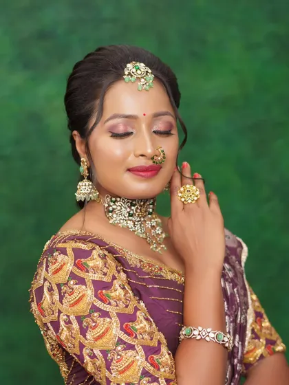 Another close-up, showing the fine details of the makeup and accessories.