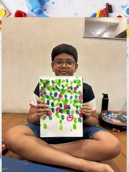 This student created a beautiful piece of art using a pointillism-like technique with his fingerprints. We explore many different art styles and methods.
