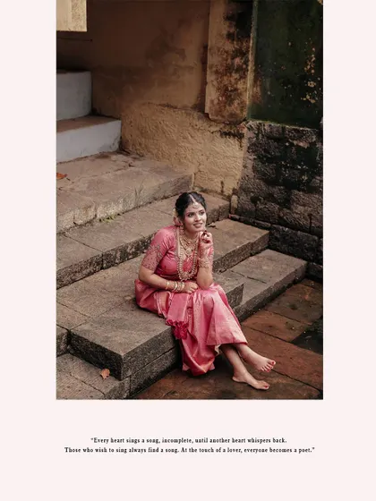 A beautiful solo portrait of the bride-to-be sitting on ancient temple steps.