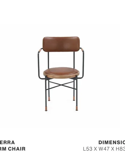 The Tierra Arm Chair, featuring a steel frame, solid oak backrest, and genuine saddle nut leather upholstery. Leather-wrapped armrests and leather-capped feet are the small details that give this piece its refined character.