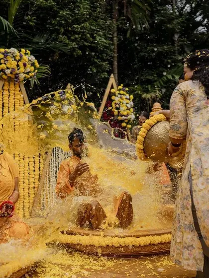 The grand entrance with colorful smoke bombs makes for an epic start to the Haldi festivities. We love capturing the energy and excitement of the wedding party.