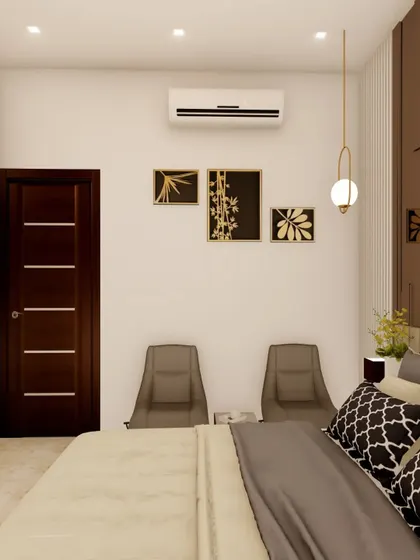 A closer look at a bedroom design concept, focusing on the seating nook with two modern chairs. The wall features minimalist art, demonstrating how we plan for both furniture layout and decor.