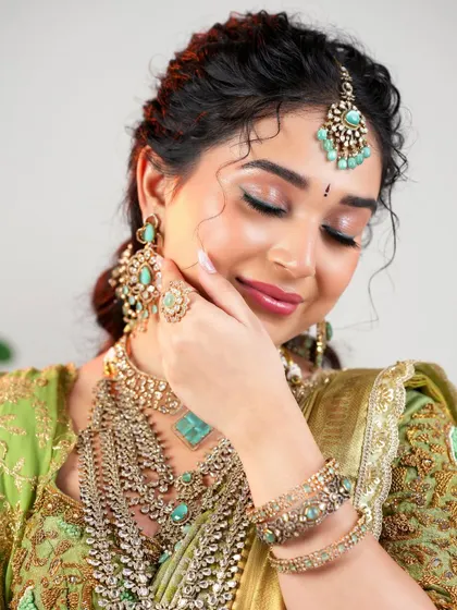 Eyes that captivate. This shot highlights the soft, shimmery eyeshadow and delicate liner that make this modern bridal look so mesmerizing.